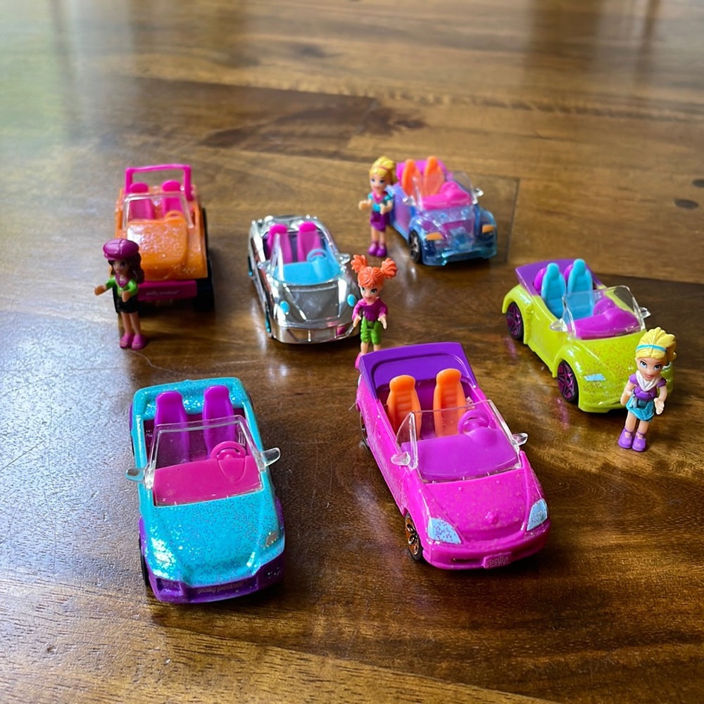 6 Polly Pocket cars; 4 Polly Pockets . 5 cars are sparkly.1 shiny silver.